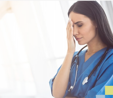 a tired woman in a nurse's robe